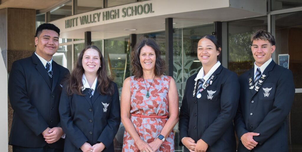 Principal Denise Johnson with the Head Students for 2024 at the front of Hutt Valley High School, Student Leadership